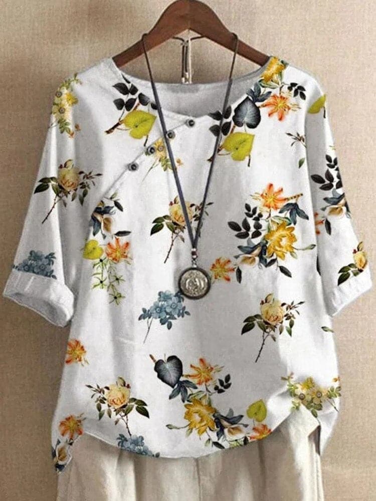 Bluse med blomsterprint og afslappet pasform