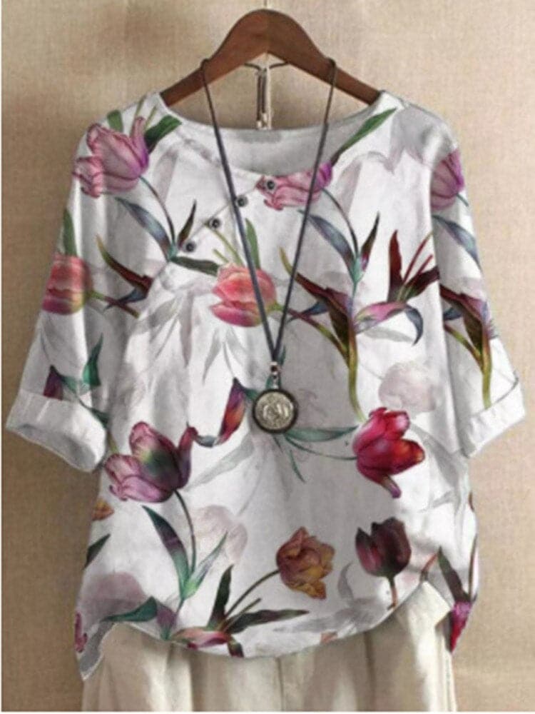 Bluse med blomsterprint og afslappet pasform