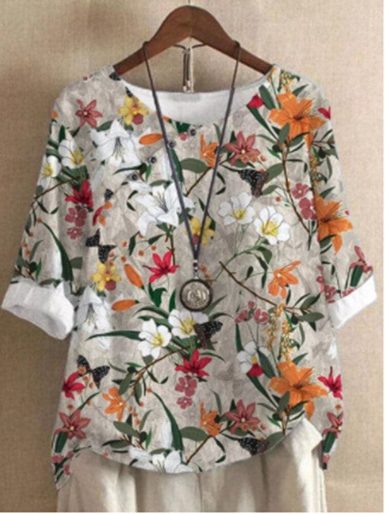Bluse med blomsterprint og afslappet pasform