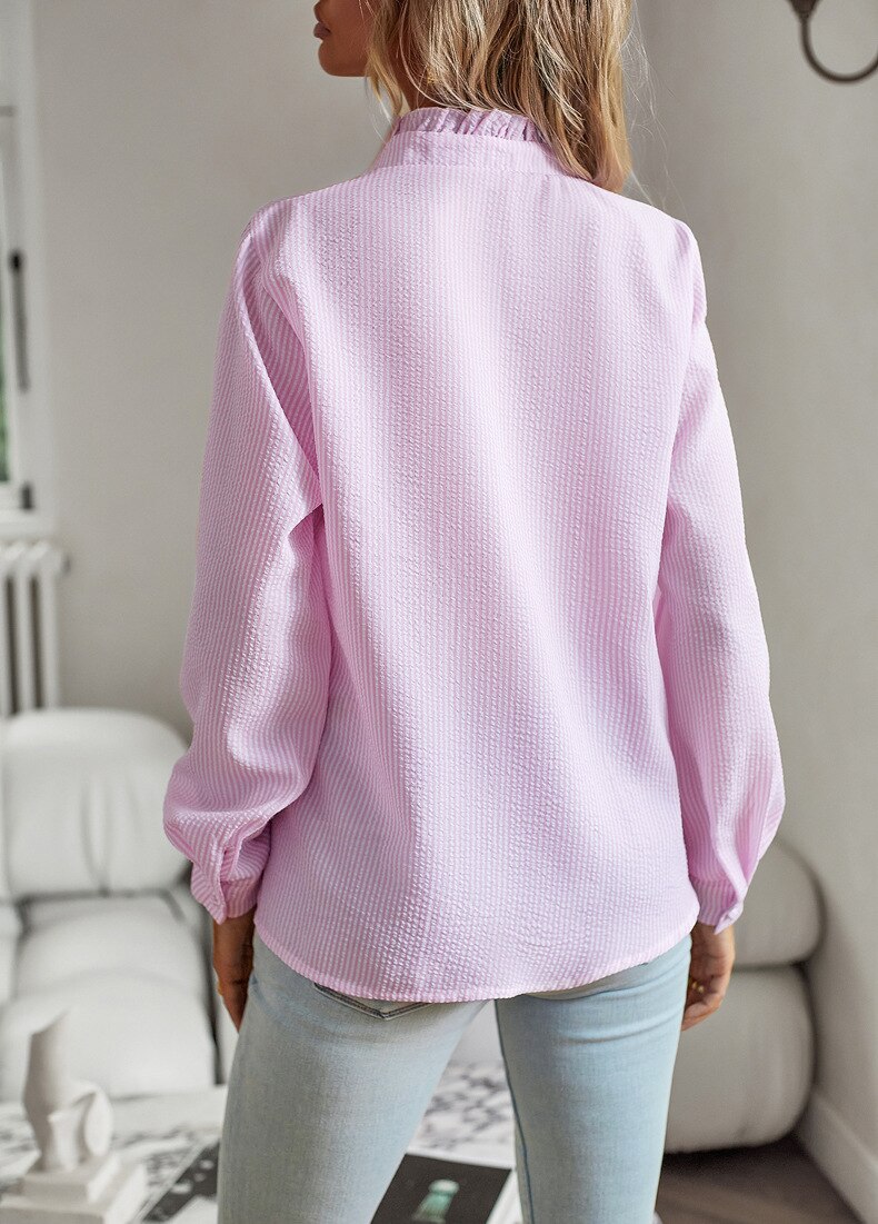 Elegant bluse med flæsedetaljer til damer
