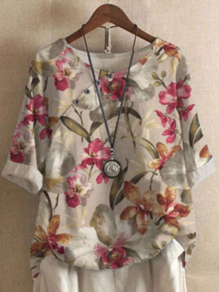 Bluse med blomsterprint og afslappet pasform