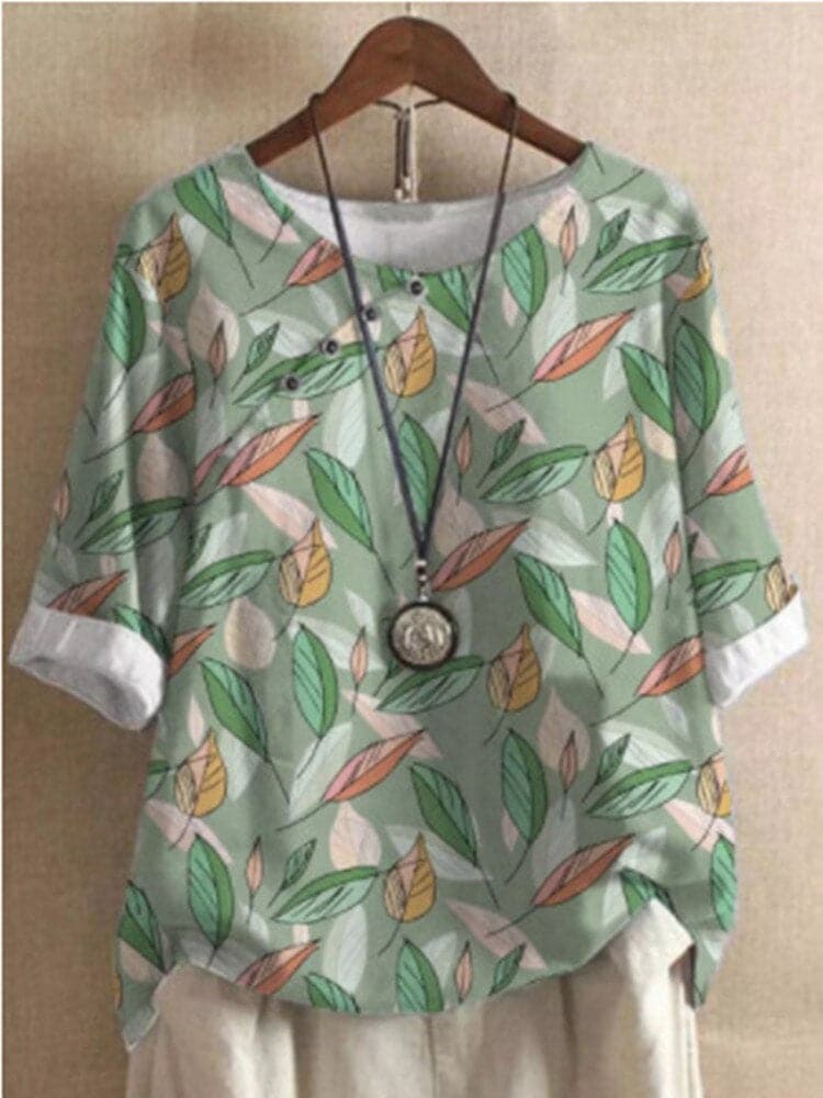 Bluse med blomsterprint og afslappet pasform