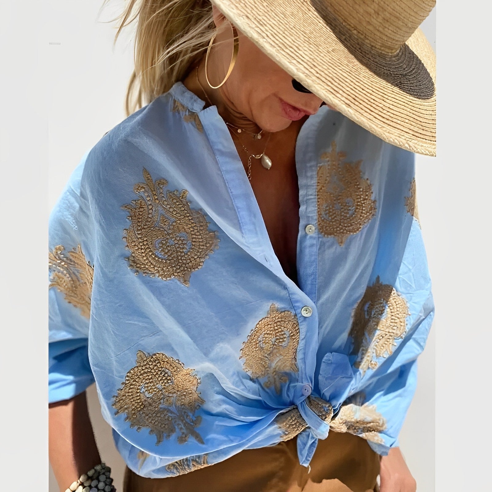 Elegant knapbluse til moderne kvinder