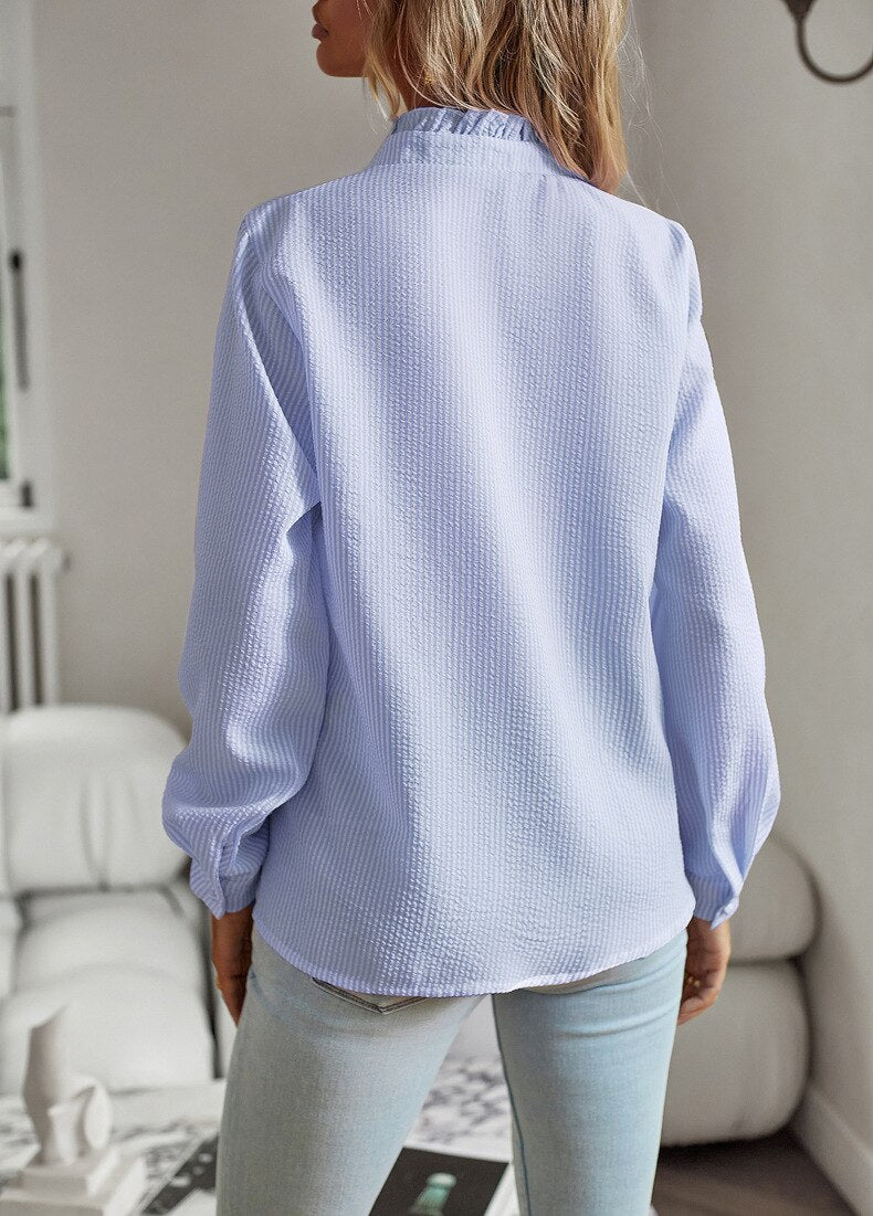 Elegant bluse med flæsedetaljer til damer
