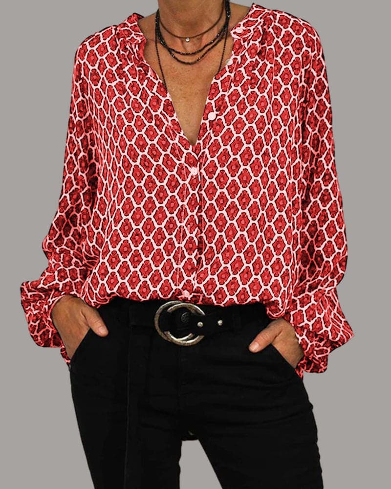 Let og stilfuld bluse med geometrisk mønster